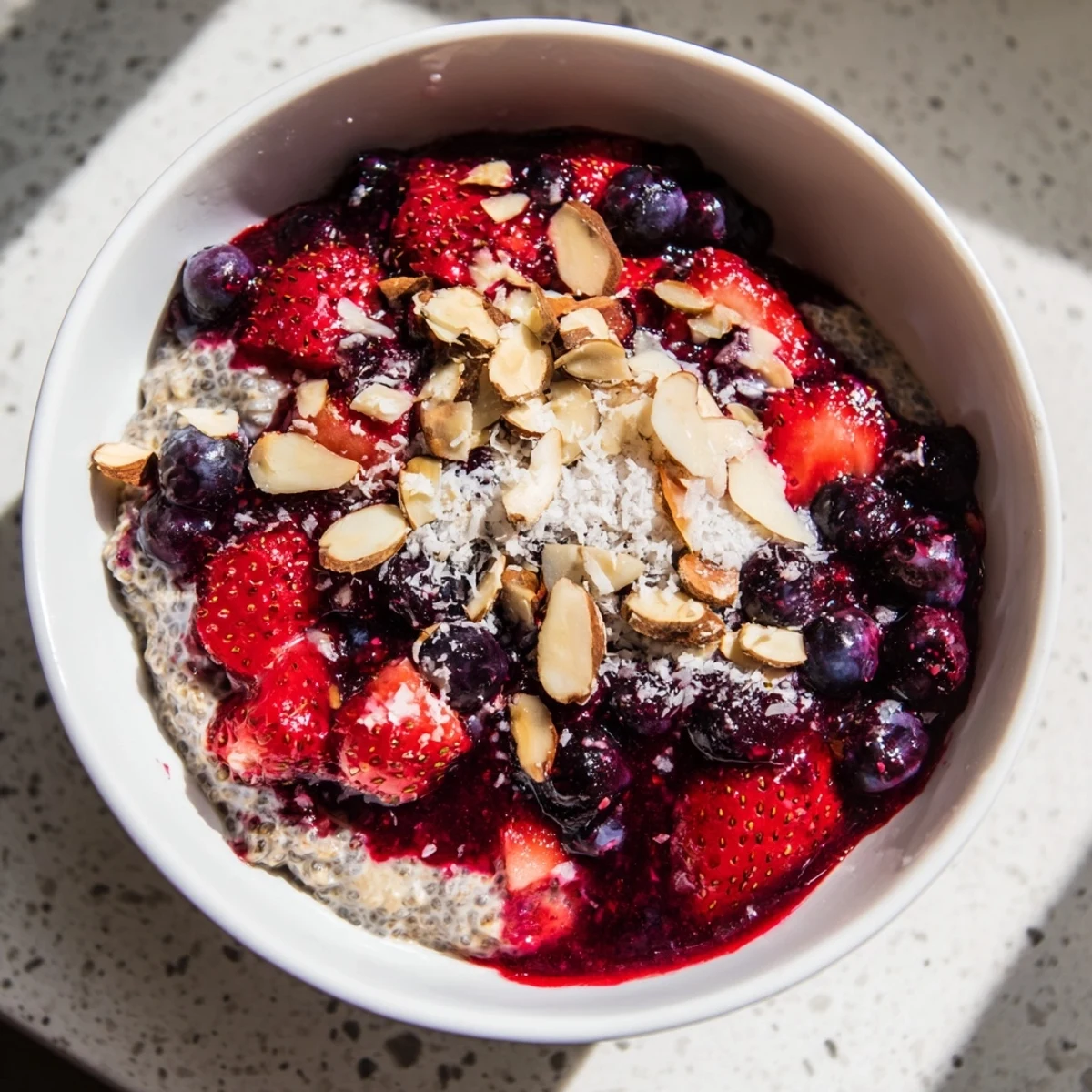Creamy Berry Chia Pudding layered with vibrant berries, a delightful vegan breakfast ready to enjoy anytime.