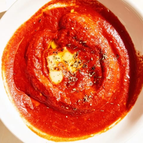 A photo of the easy Instant Creamy Marinara Hack, glistening and ready to spoon over cooked pasta.